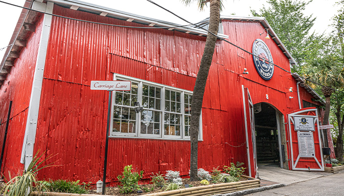 Exterior of the Palmetto Carriage Works famous Big Red Barn in Charleston, South Carolina